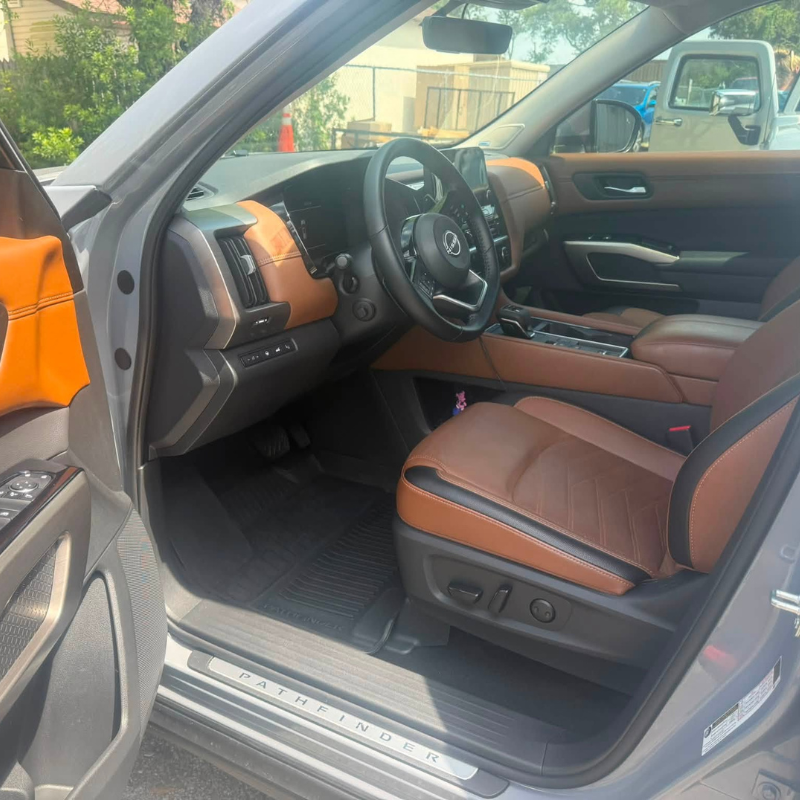 Nissan Pathfinder tan leather interior after detail